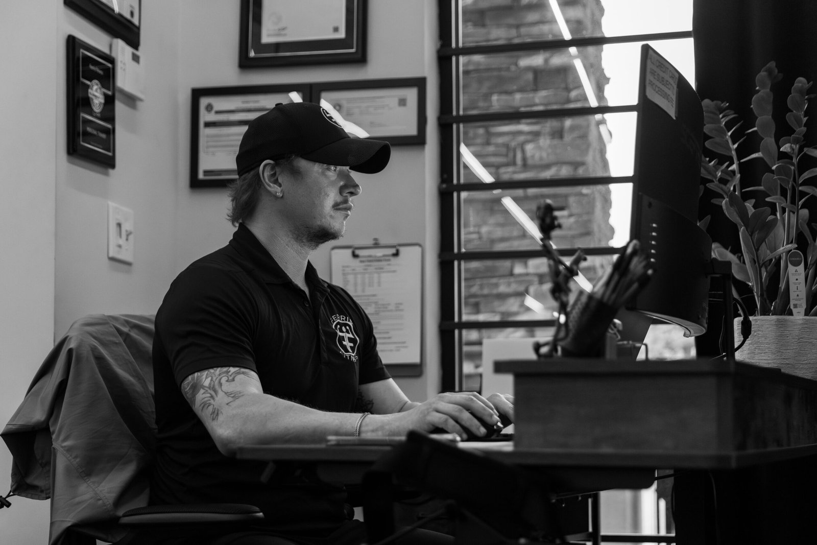 Coach planning client programs at Ferris Fitness